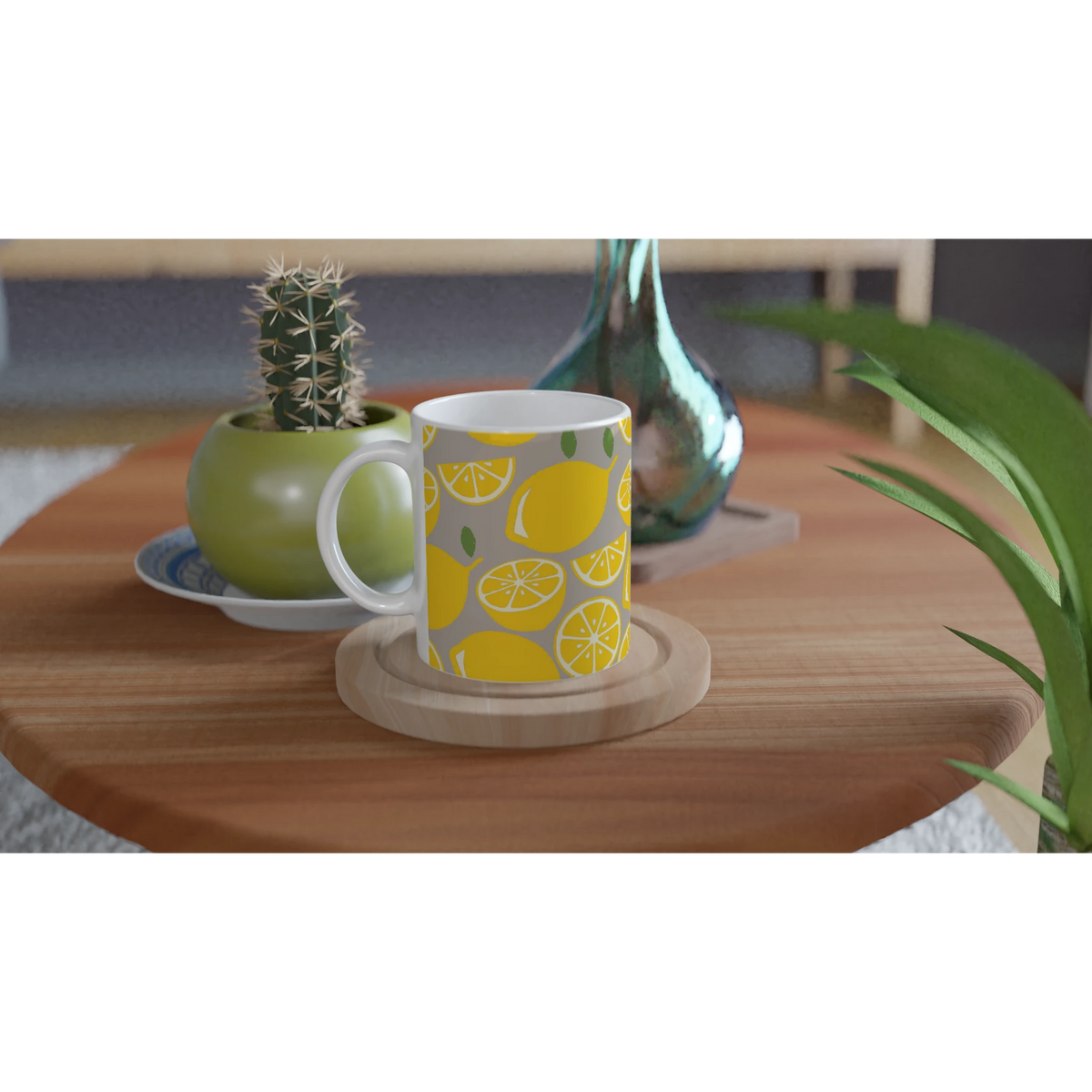 Cute Lemon Mug with citrus slice design on a wooden table beside a cactus and green vase.
