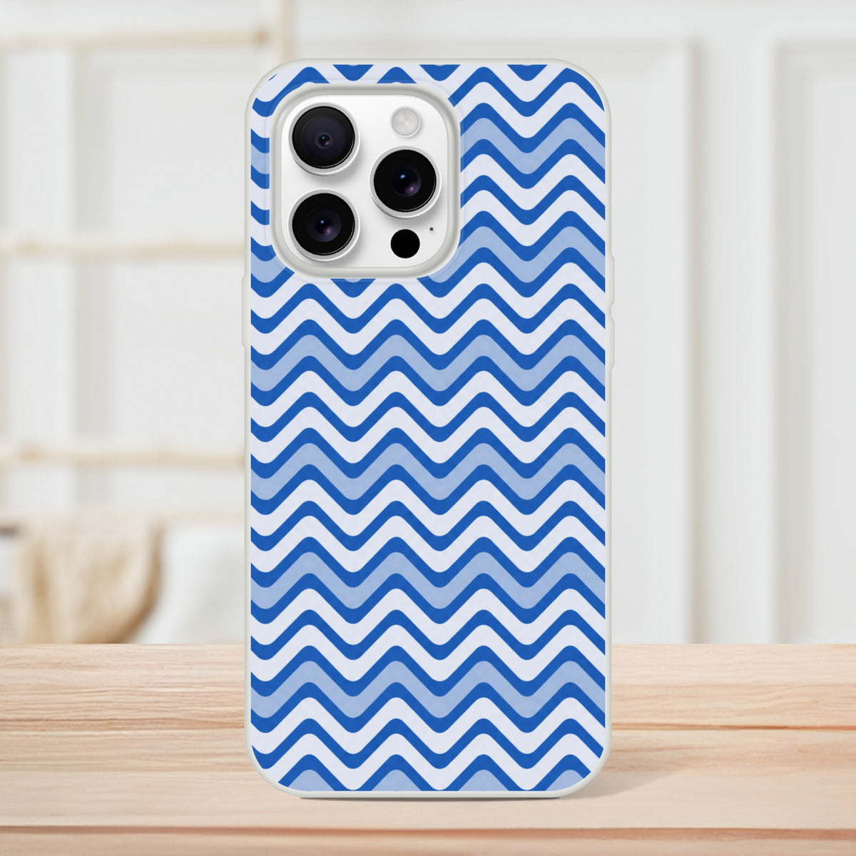 Blue wavy stripe iPhone case with retro geometric chevron pattern. Protective matte TPU cover for iPhone 13-16 models.