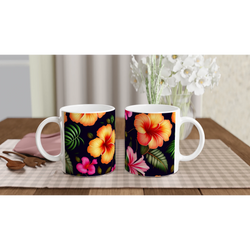 Two tropical hibiscus mugs with vibrant orange and pink blossoms on a black background, set on a checkered table.