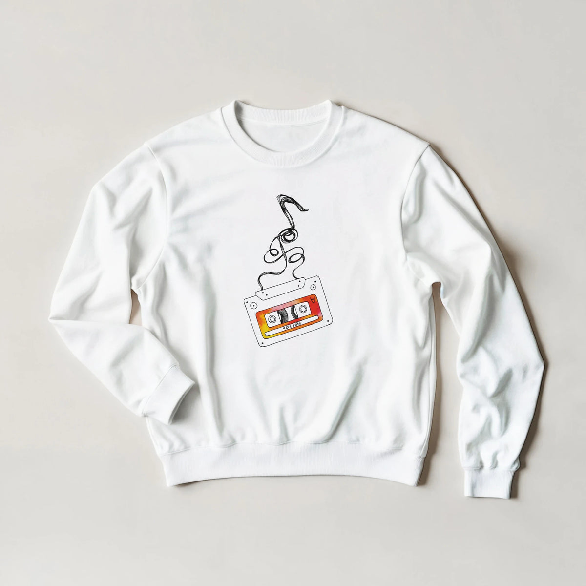 White crewneck sweatshirt featuring a retro orange cassette tape graphic with black music notes unspooling upward for vintage streetwear.