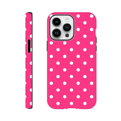 Hot pink and white polka dot tough iPhone case with dual-layer shock absorption and rugged protection for daily use.