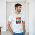 Male model wearing white Pride LGBTQ graphic tee with rainbow square on soft cotton blend fabric.
