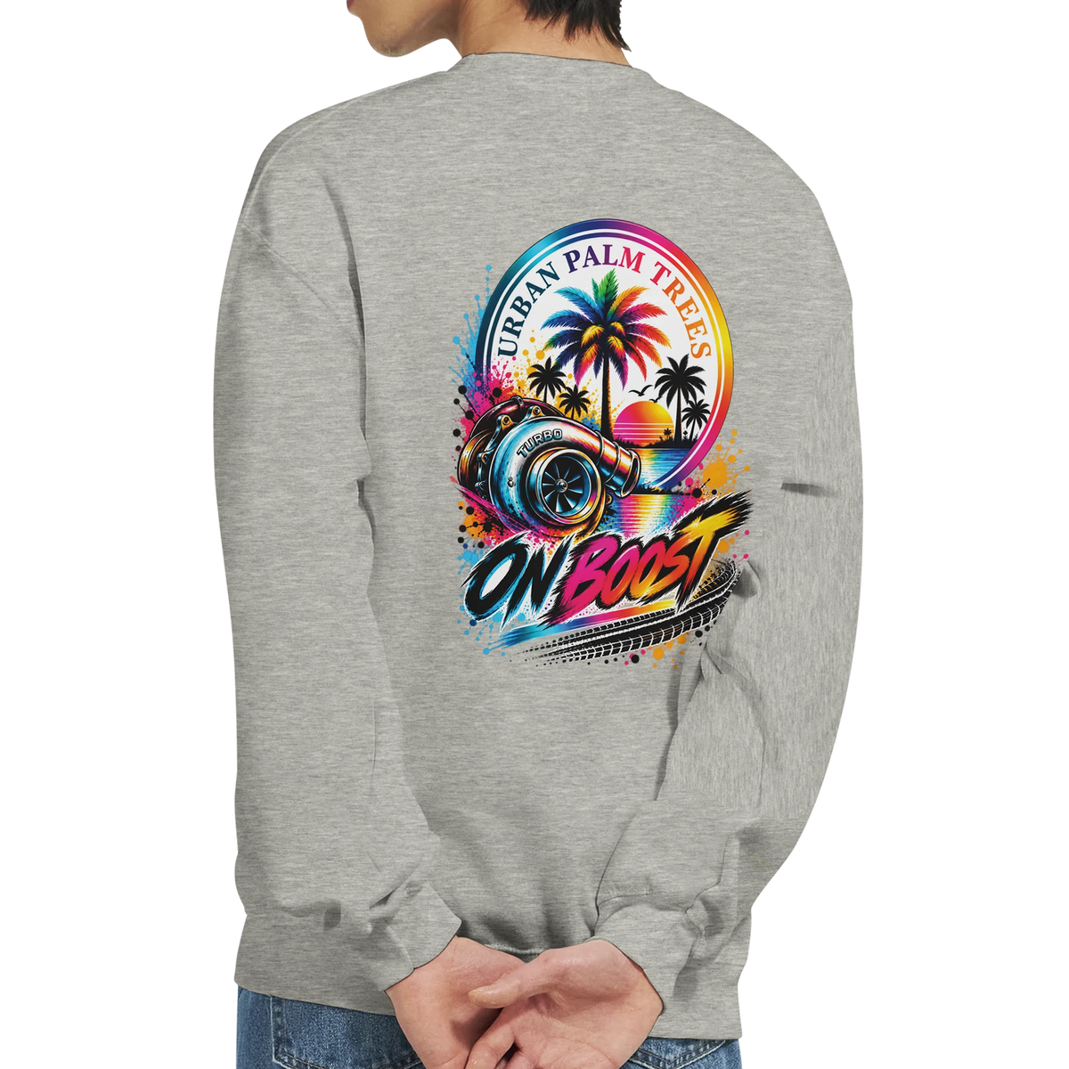 Grey sweatshirt back featuring colorful "On Boost" turbocharger and palm tree graphic celebrating modified car culture.