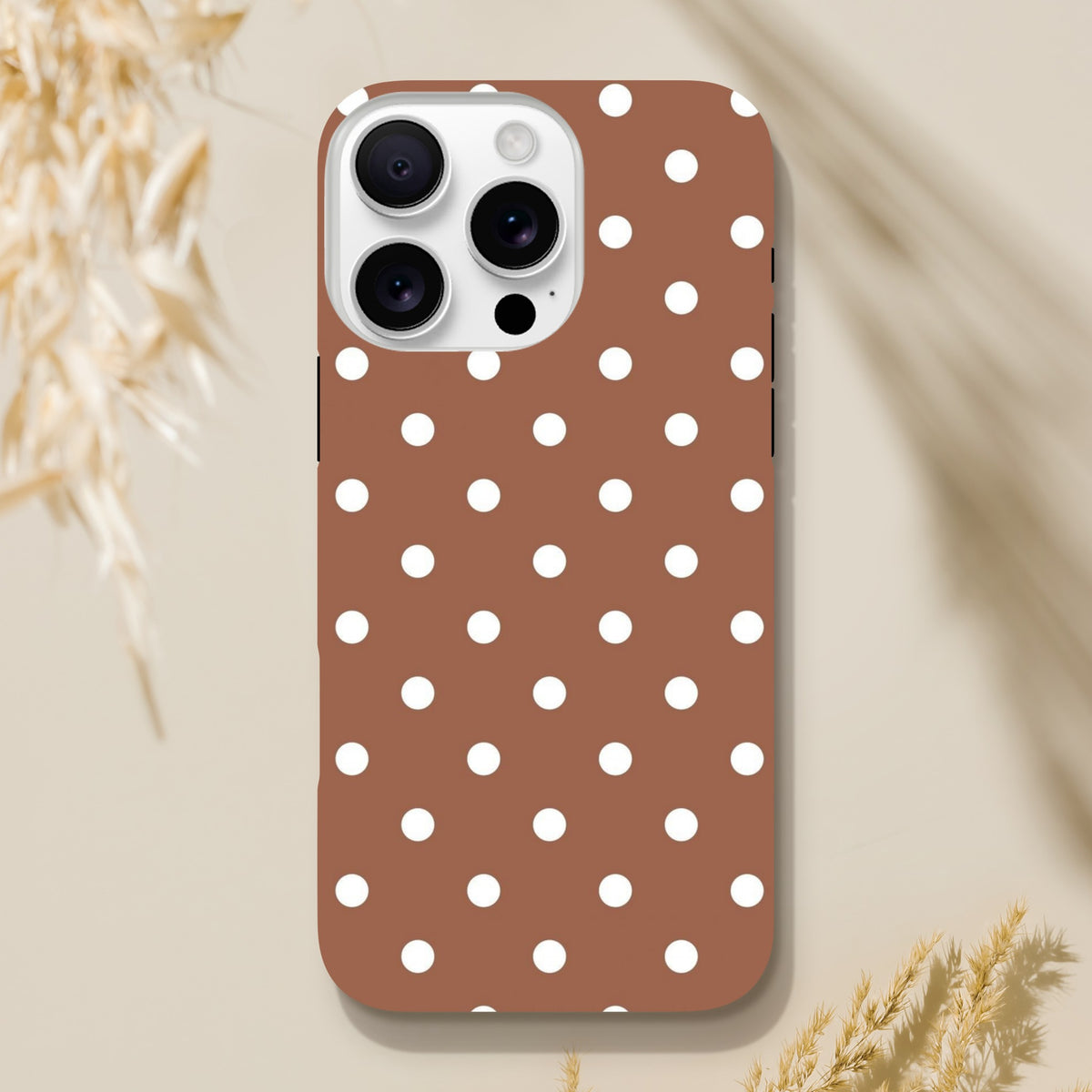 Retro brown and white polka dot tough iPhone case with dual-layer impact resistance and shock-absorbing TPU for iPhone 13-16 Pro Max.