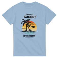 Retro tropical sunset t-shirt featuring palm trees, island lighthouse, and Beach Resort text in vintage coastal graphic design.