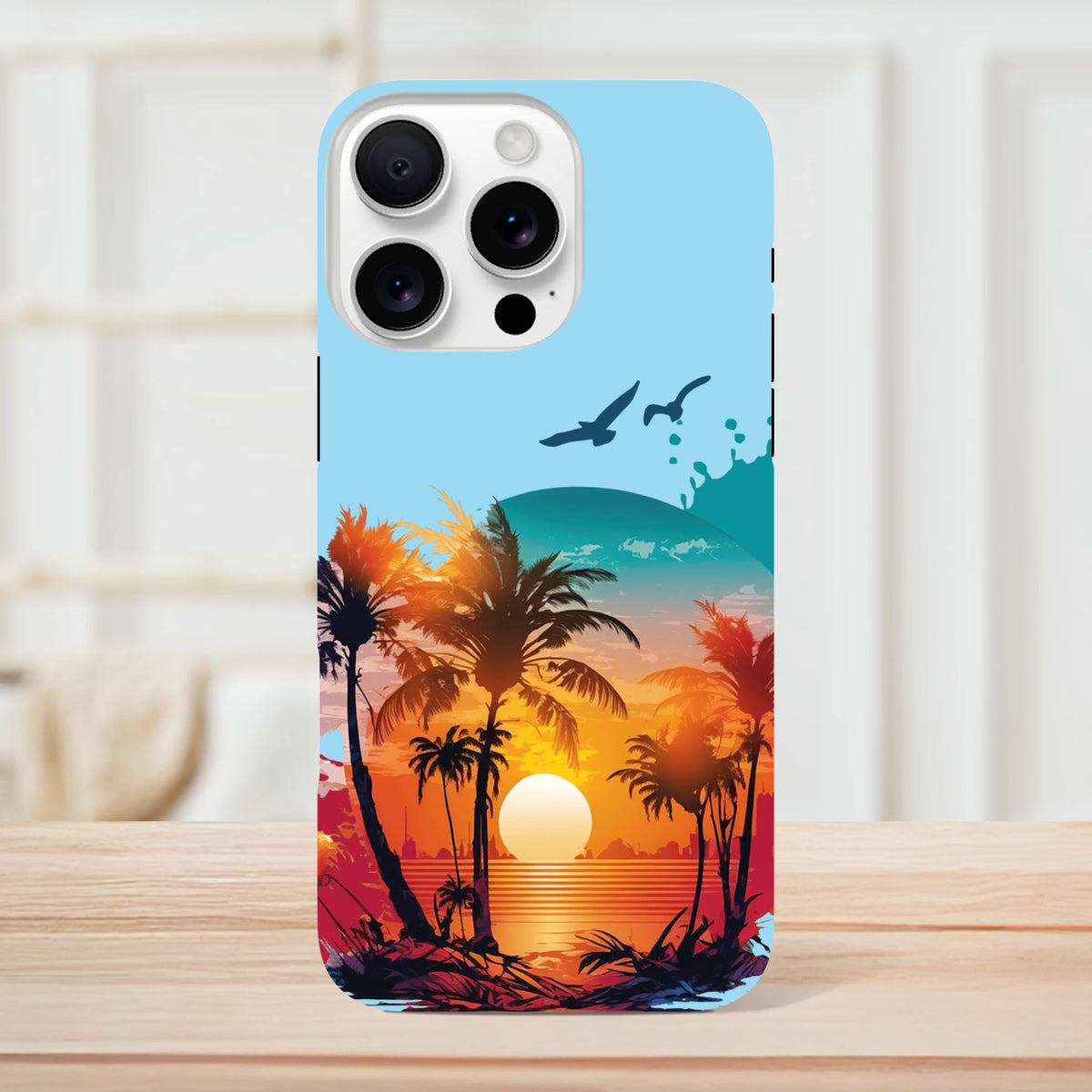 Tropical sunset palm tree tough iPhone case featuring vibrant beach sunset, silhouetted palms, and seagulls for drop resistance.
