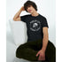 Male model wearing black motorcycle club graphic T-shirt with skull emblem and Ride or Die Rider Club text.
