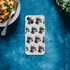 Transparent iPhone case with a repeating gangster dog pattern wearing sunglasses and chains for iPhone 13-16.