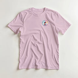Pink short-sleeve crew neck t-shirt featuring a colorful retro Urban Palm Trees graphic on the left chest.