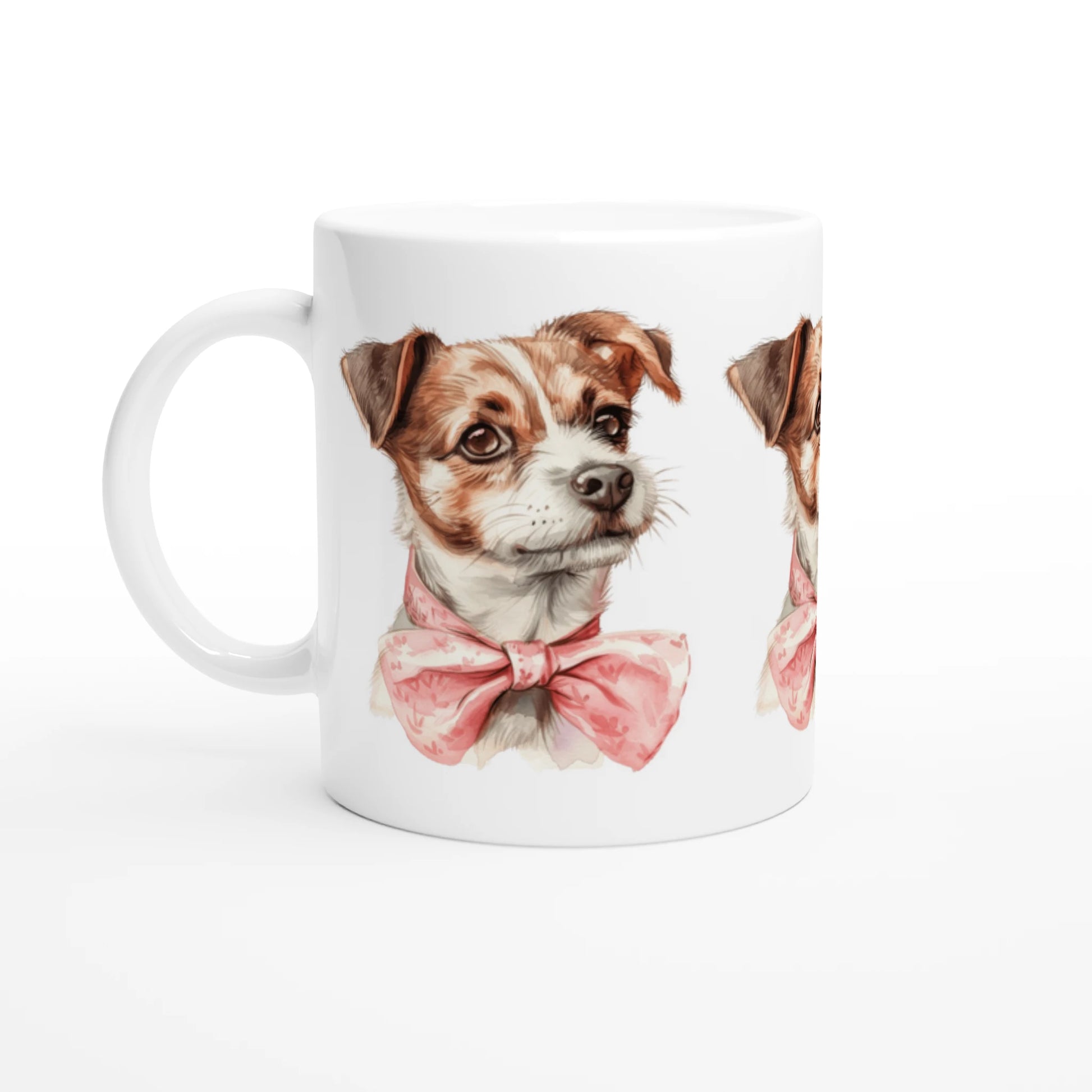 White ceramic mug featuring two cute dogs wearing pink bow ties.