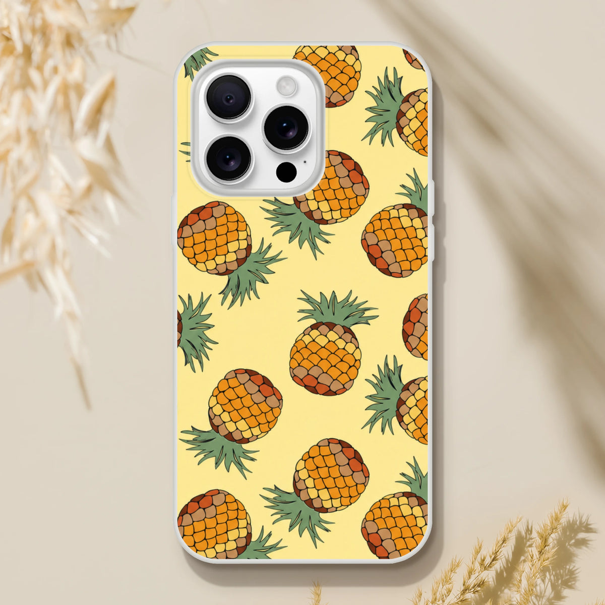 Yellow pineapple-pattern iPhone case for 13–16, slim matte cover with vibrant tropical fruit print.