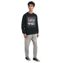 Male model wearing Car Jumper JDM Sweatshirt; black, soft cotton-poly blend with urban car graphic.