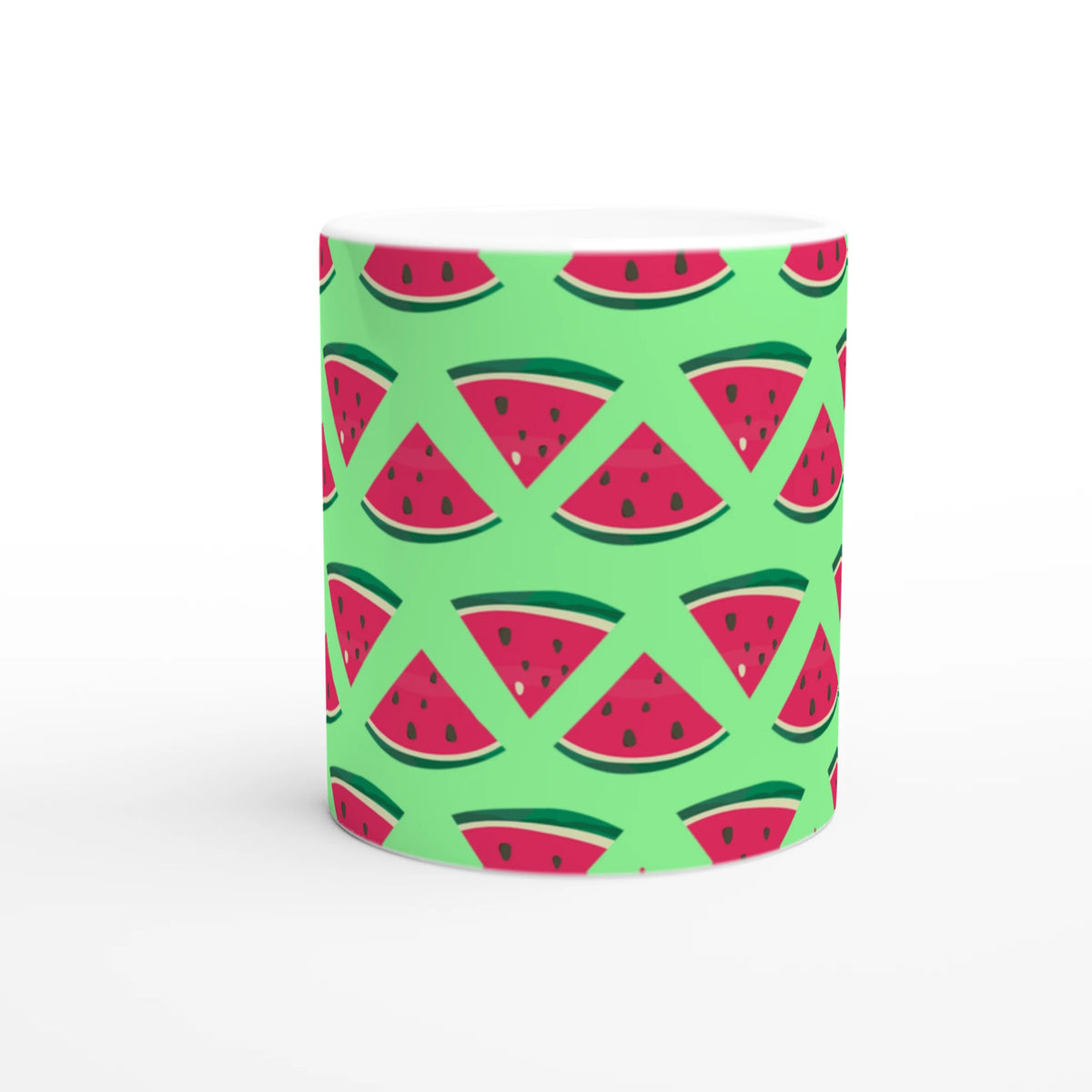 Cute ceramic mug featuring a repeating pattern of red watermelon slices on a lime green background for a fresh summer vibe.
