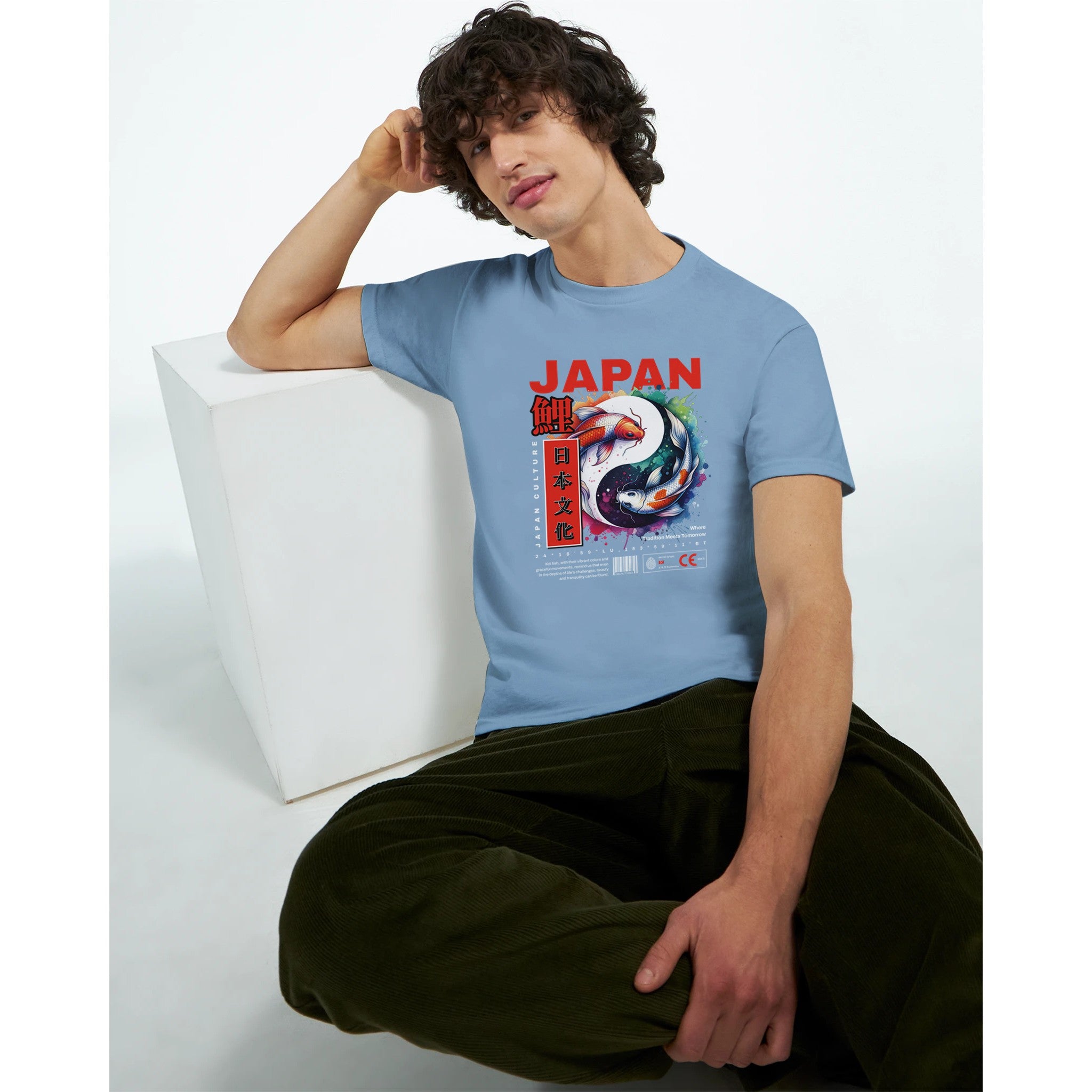 Men's blue Japanese graphic tee with koi artwork and bold JAPAN lettering, crew neck.