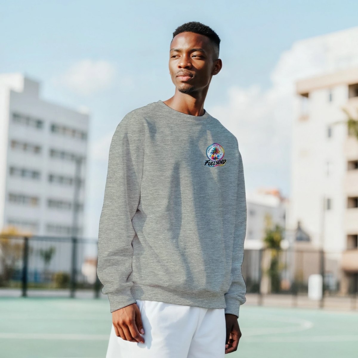 Grey petrolhead sweatshirt featuring a colorful palm tree logo, representing modified car culture streetwear.