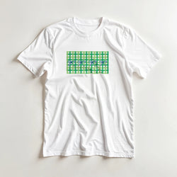 White T-shirt featuring a green gingham square with blue bow accents on the front.