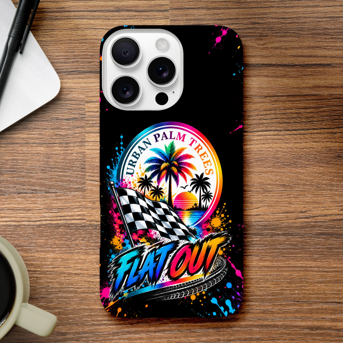 Black iPhone case featuring colorful "Urban Palm Trees" sunset design, checkered flag, and "Flat Out" text with paint splatters.