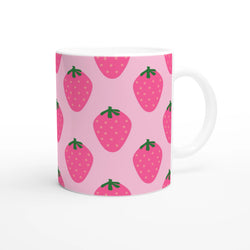 Cute pink strawberry mug with green leaves pattern and white handle.