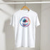 Retro palm tree T-shirt for men on hanger, colorful circular palm tree design, Y2K streetwear style.