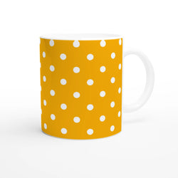 Orange and white polka dot ceramic coffee mug with white handle, ideal for daily brews and gifting.