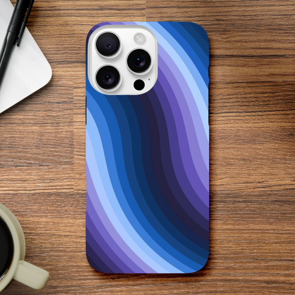 Blue retro wave iPhone case with Y2K wavy stripes and protective guard rails for daily impact and wireless charging.