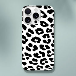 White iPhone case featuring a bold black snow leopard animal print pattern with a tough, shock-absorbing design for daily protection.