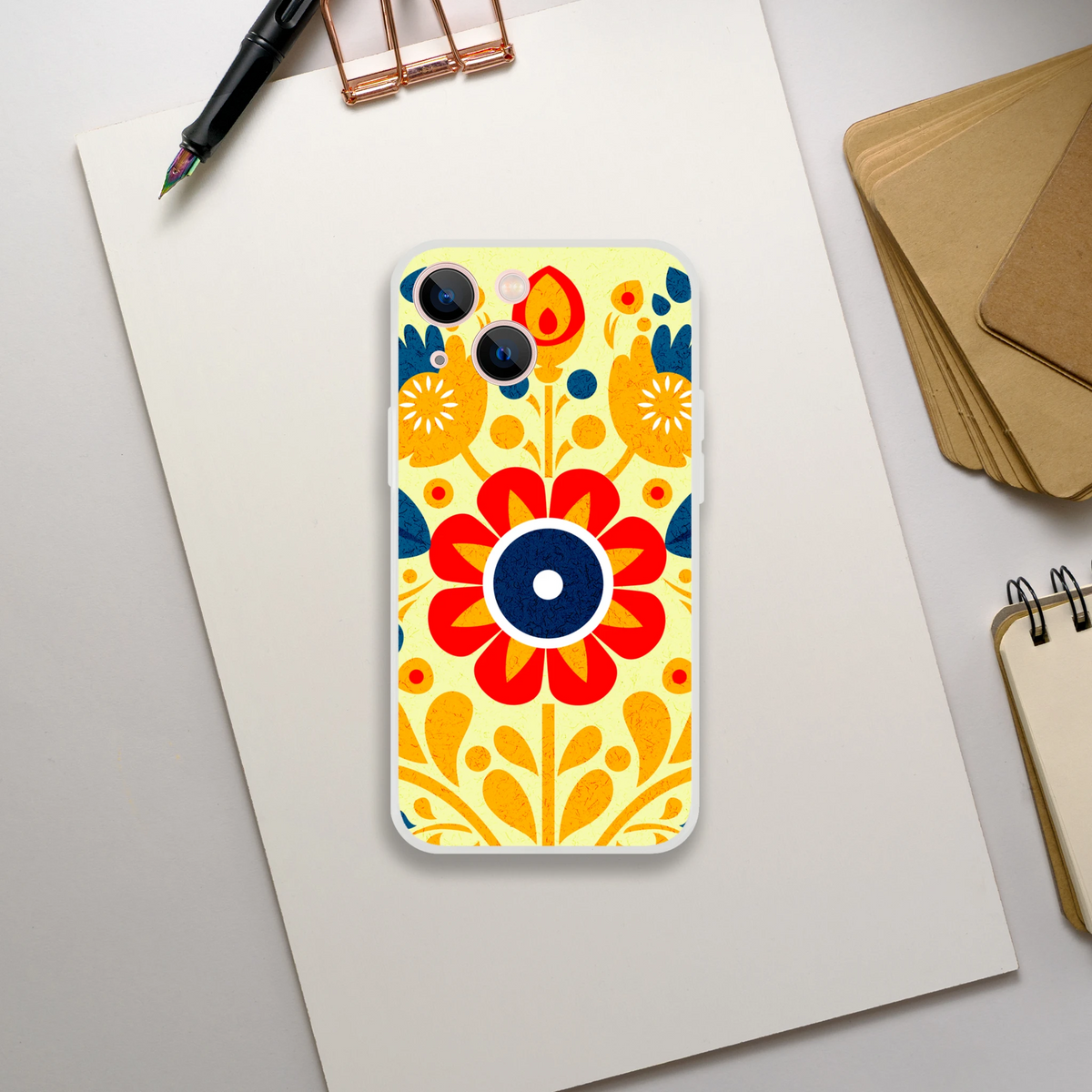 Vintage floral iPhone case with bold orange petals on a yellow background, retro aesthetic for iPhone 13-16.