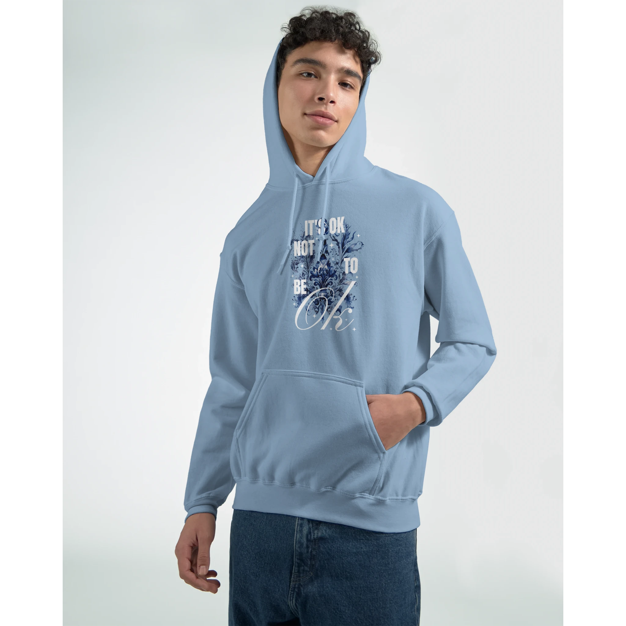 Light blue 50/50 cotton-poly hoodie with It's OK Not To Be OK graphic, front pocket and drawstring hood.