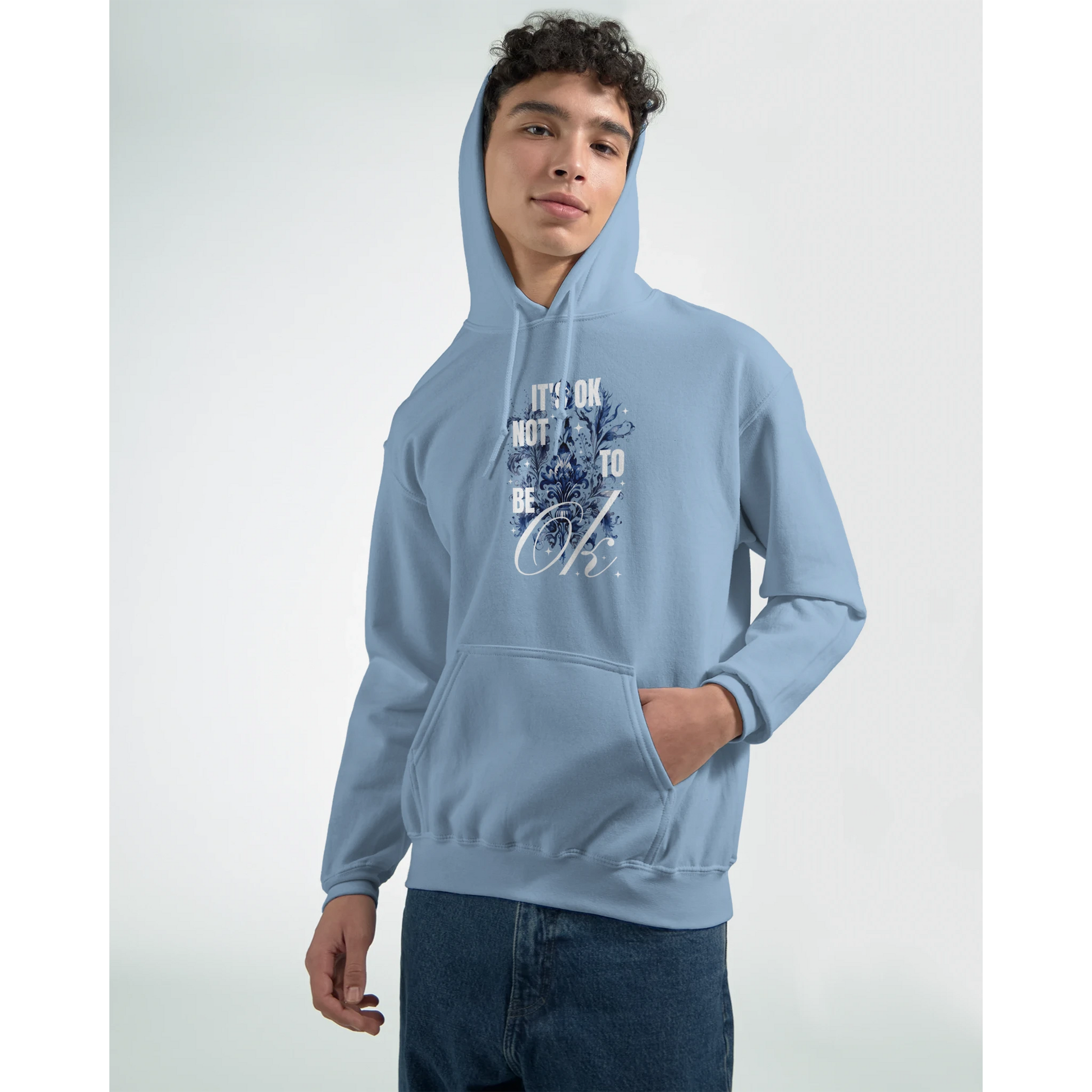 Light blue 50/50 cotton-poly hoodie with It's OK Not To Be OK graphic, front pocket and drawstring hood.