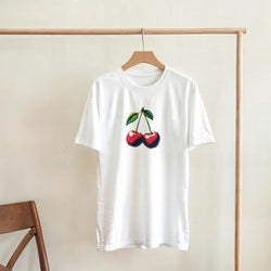 Cherries Women's Graphic T-Shirt on white with red cherry print and green leaves in soft cotton blend.