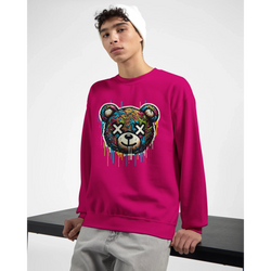 Male model wearing bright pink Teddy Bear graphic sweatshirt with dripping multicolor art and X-eyed bear.