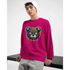 Male model wearing bright pink Teddy Bear graphic sweatshirt with dripping multicolor art and X-eyed bear.
