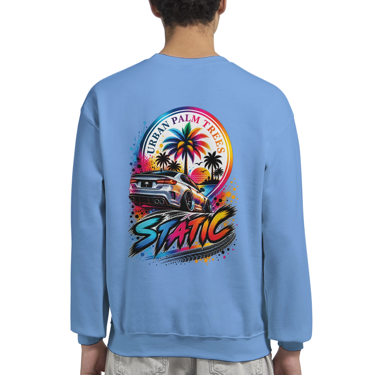 Light blue crewneck sweatshirt featuring a colorful back graphic of a lowered modified car, tropical palm trees, and retro "Static" typography.