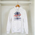 Palm Tree Women’s Hoodie in white with navy palm graphic and red California text, soft cotton blend