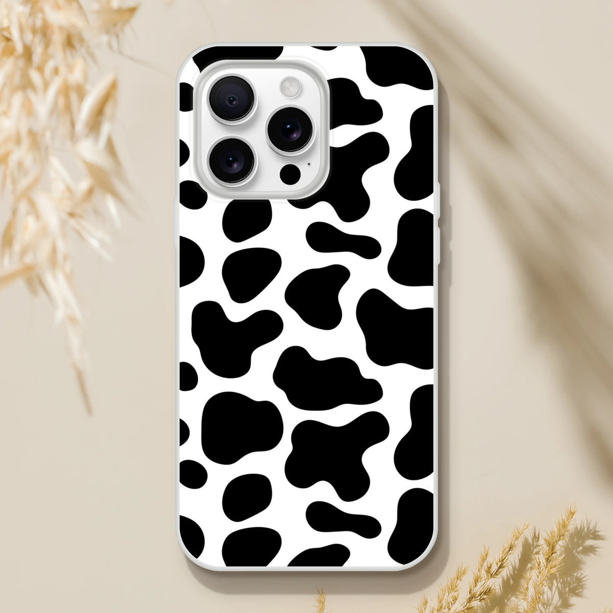 Black and white cow-print iPhone case for iPhone 13-16, cute Y2K animal style.