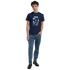 Male model wearing navy cotton-blend T-shirt featuring white 'It's OK Not To Be OK' graphic.