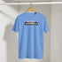 Blue Believe In Yourself t-shirt on hanger with bold retro slogan graphic.