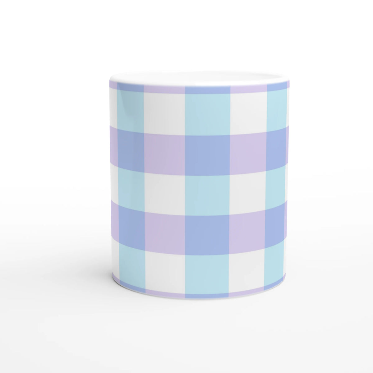 Pastel blue and lavender gingham ceramic mug with a white interior, cute checkered coffee cup.