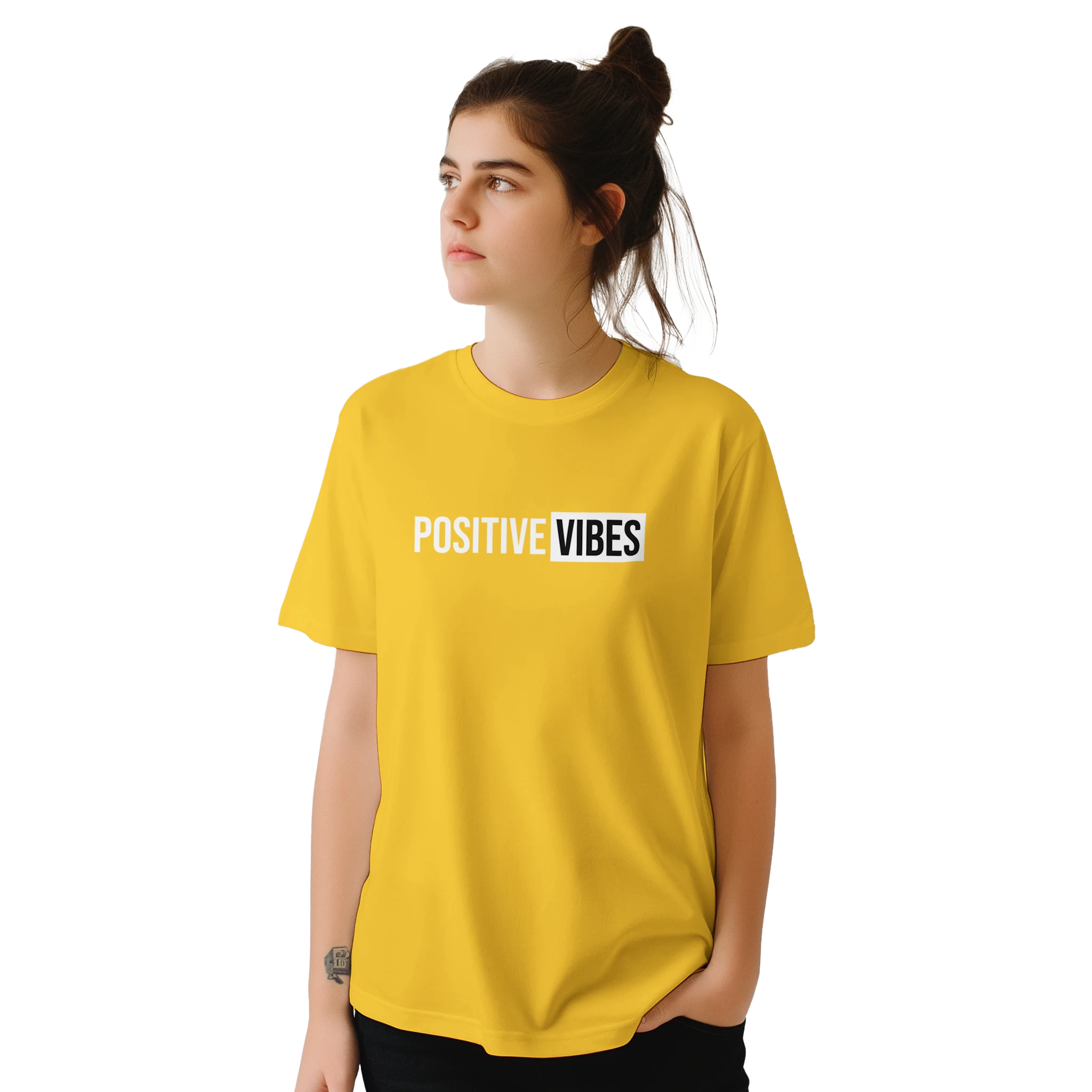 Woman in yellow retro-slogan T-shirt with POSITIVE VIBES print.