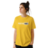Woman in yellow retro-slogan T-shirt with POSITIVE VIBES print.