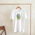 White women's lemon graphic T-shirt in a soft cotton blend with front lemon illustration.