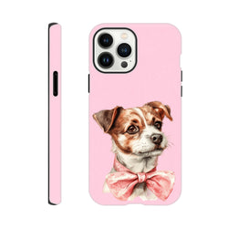 Pink tough iPhone case featuring a cute puppy dog wearing a floral bow. Shock-absorbent flex cover for iPhone 13-16.