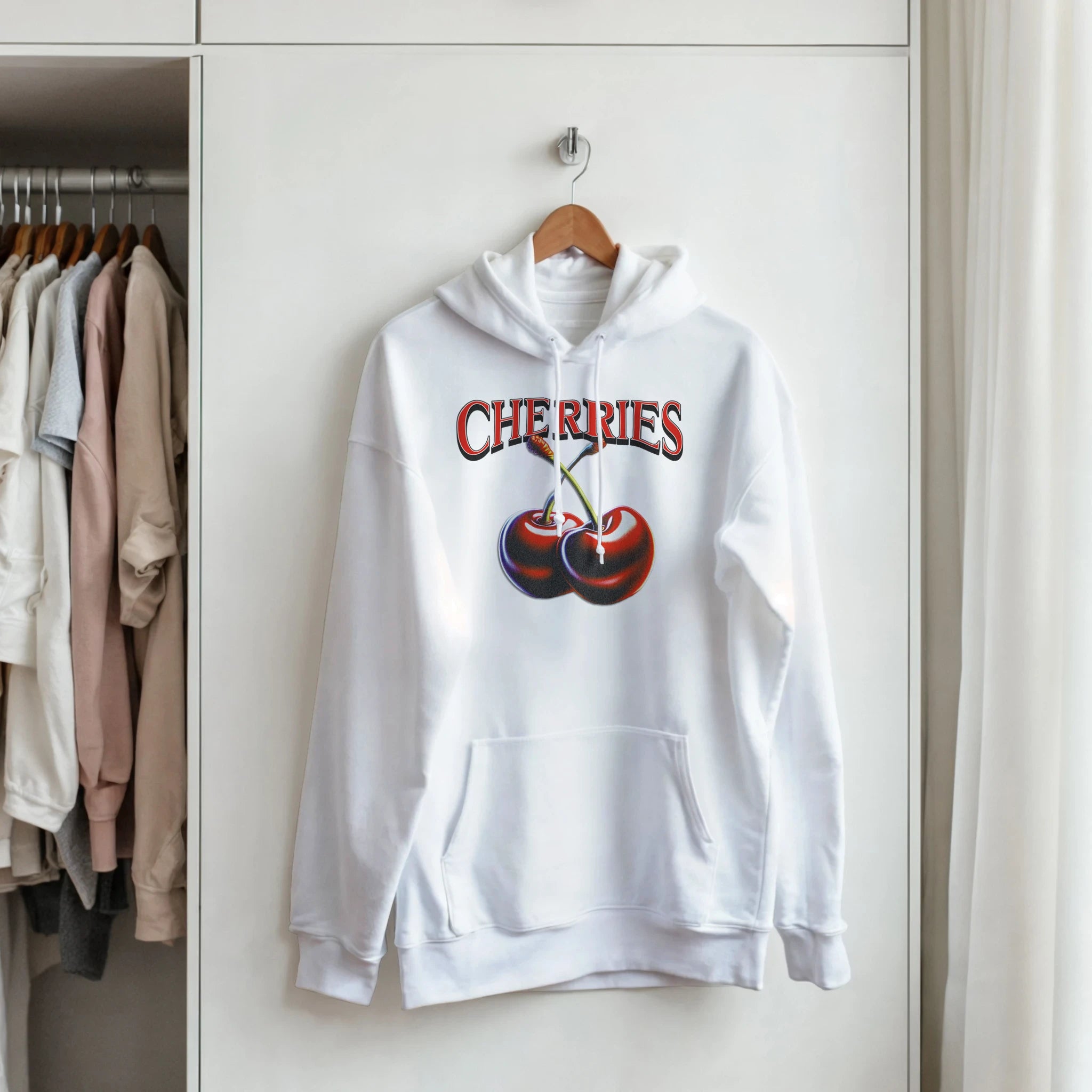 Women's Y2K Cherries Hoodie featuring bold cherry graphic and CHERRIES lettering on a white hoodie.