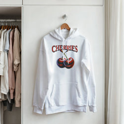 Women's Y2K Cherries Hoodie featuring bold cherry graphic and CHERRIES lettering on a white hoodie.