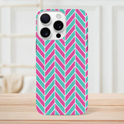 Pink and turquoise herringbone geometric iPhone case with gloss finish and shock-absorbing protection for commuting.