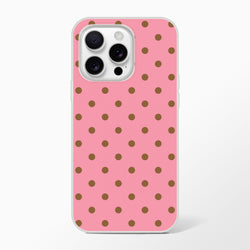 Retro pink iPhone case with brown polka dots and white bumper. Flexible TPU phone cover for iPhone 13-16 series.