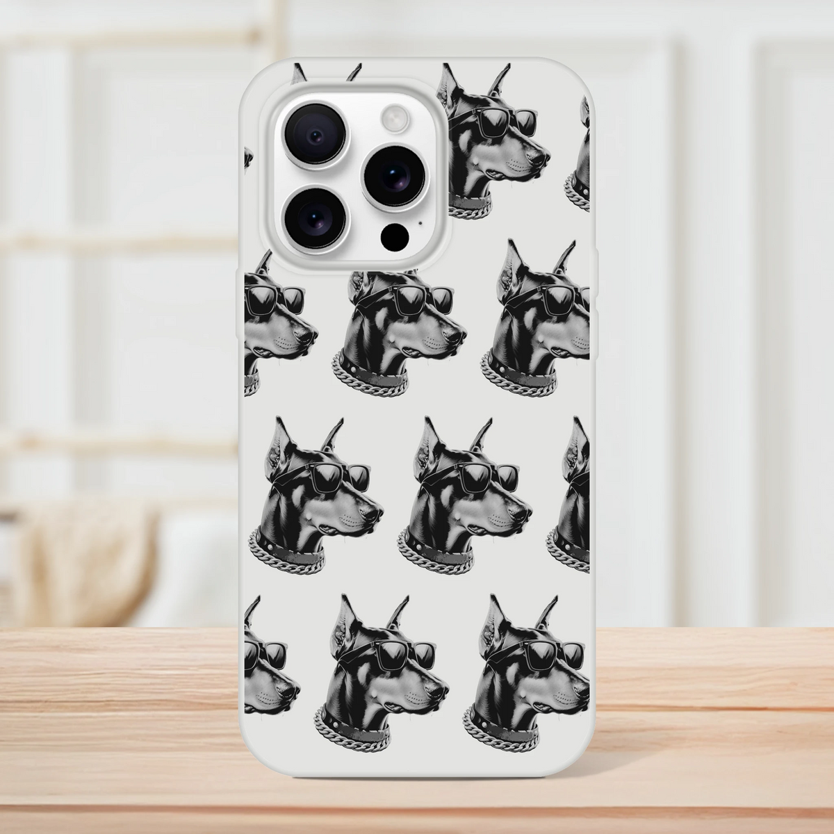 Transparent iPhone case with a repeating gangster dog head pattern wearing sunglasses and a chain for iPhone 13-16.