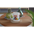 Gent Dog Mug Gift For Her: white ceramic mug with colorful dog illustrations wearing glasses on a wooden coaster