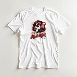 White tee featuring a retro pop art graphic of a girl with sunglasses and a lollipop. Vintage "Retro Girl" design with halftone dots and a heart bubble.