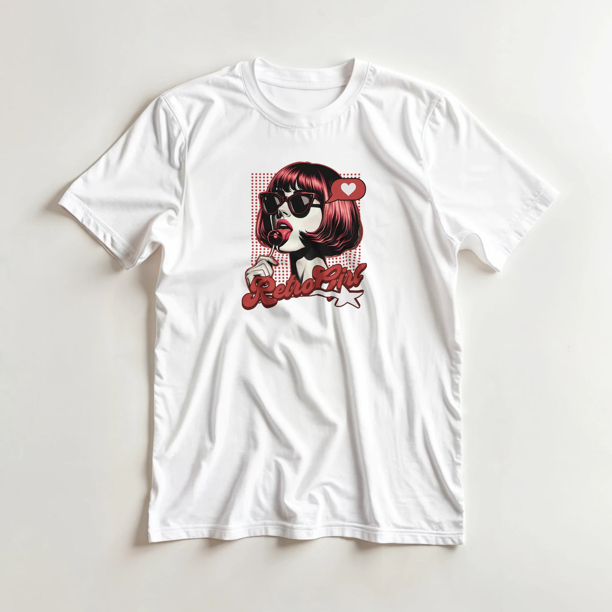 White tee featuring a retro pop art graphic of a girl with sunglasses and a lollipop. Vintage "Retro Girl" design with halftone dots and a heart bubble.